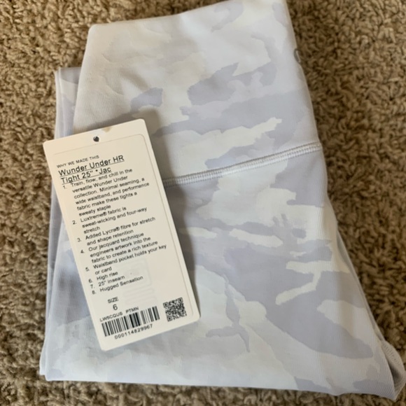 lululemon tights. Worn once, tag is for product info only. A small mark as shown - Picture 2 of 3
